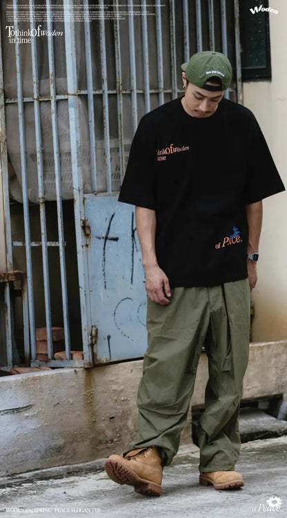 WODEN 2025 Spring & Summer 004 Peace Slogan Tee