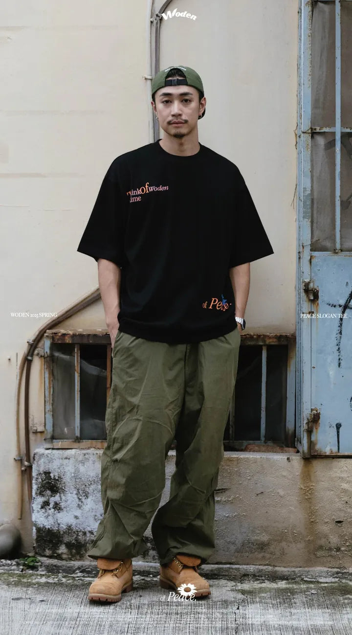 WODEN 2025 Spring & Summer 004 Peace Slogan Tee