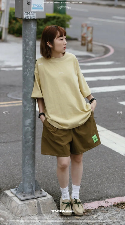 WODEN 2024 Spring & Summer 011 TV Noise Tee